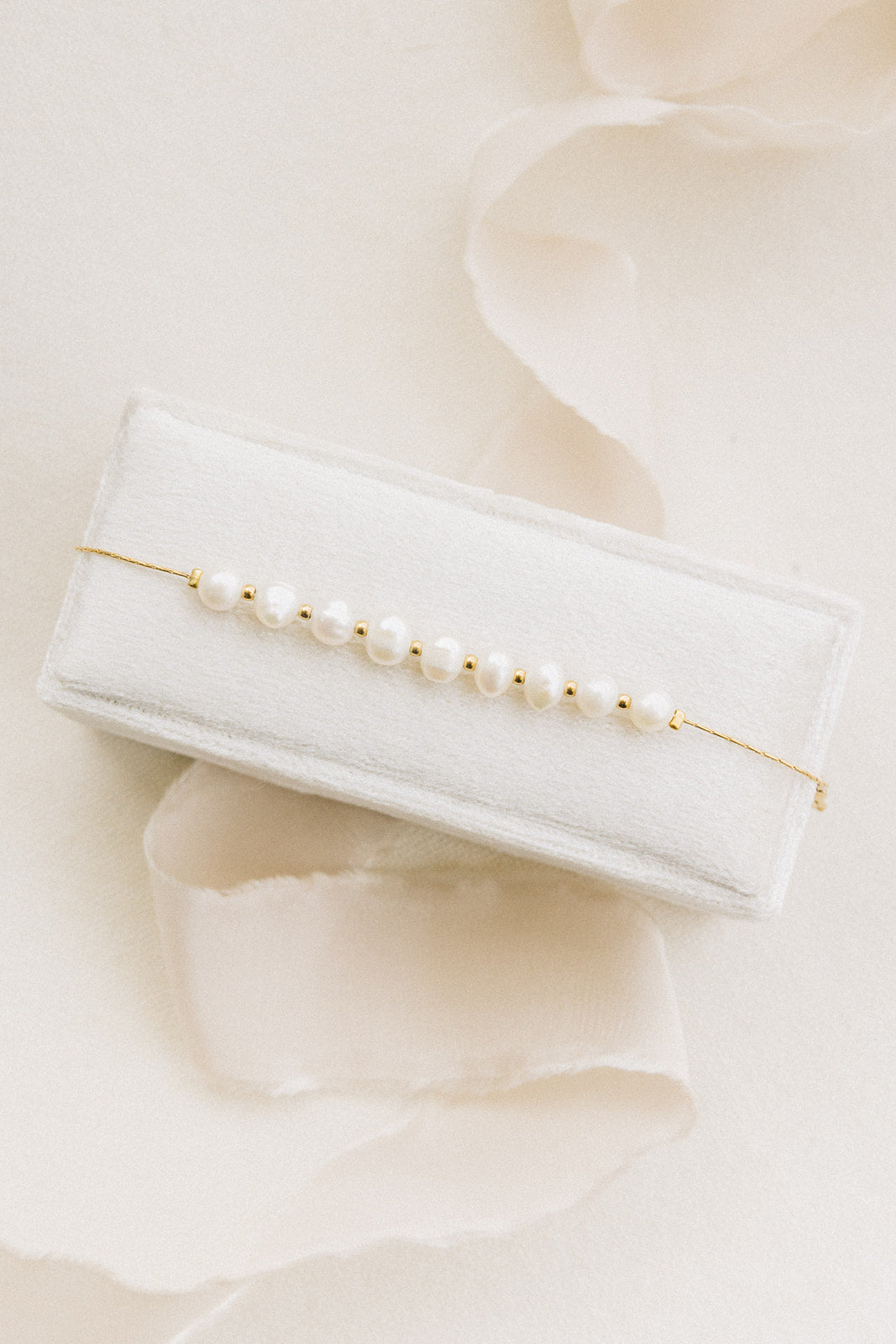 Pearl Bracelets & Pouches